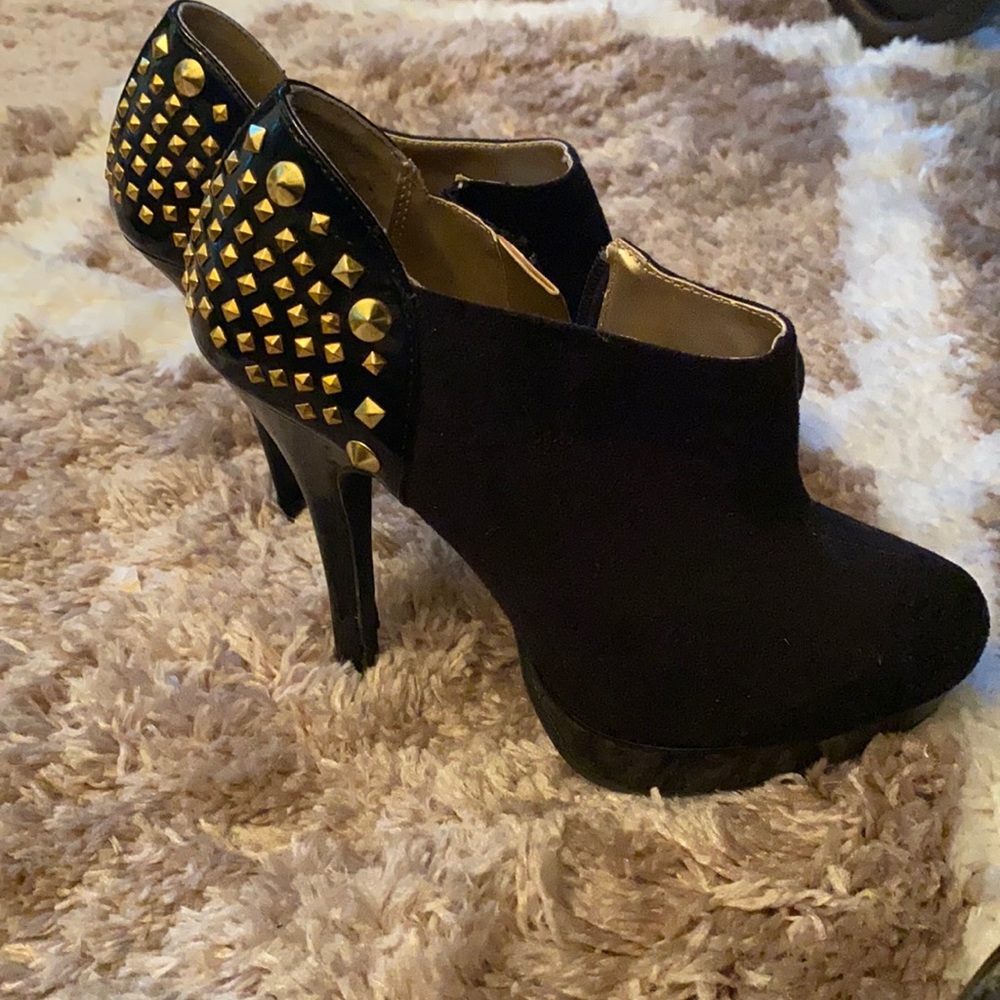 Black platform boot with a heel & gold studs